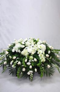 Arreglo floral para ataúdes funerarios